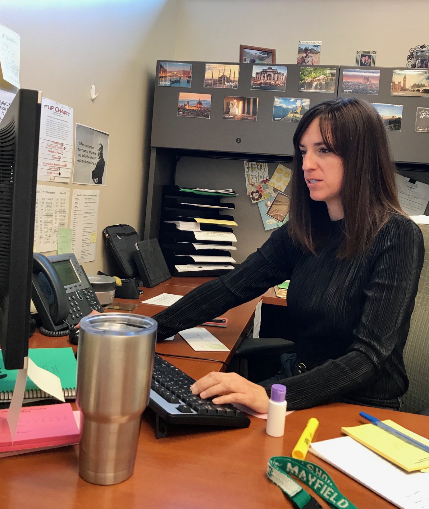 Rachel McBride works in her new guidance counselor office on the morning of April 24, 2017.
