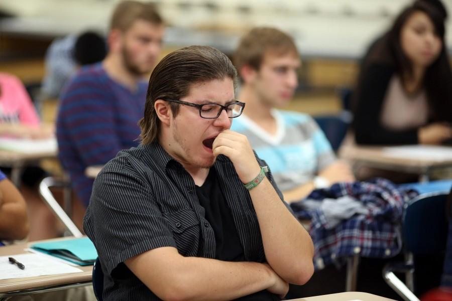 Matt Goodmanson, a junior, yawns during teacher Rich Schrams eighth period honors physics class Aug. 28, 2014 at Buffalo Grove High School in Buffalo Grove, Ill. The American Academy of Pediantrics issued a statement saying school start times should be pushed to 8:30 a.m. or later, as many students arent getting enough sleep. (Brian Cassella/Chicago Tribune/MCT)