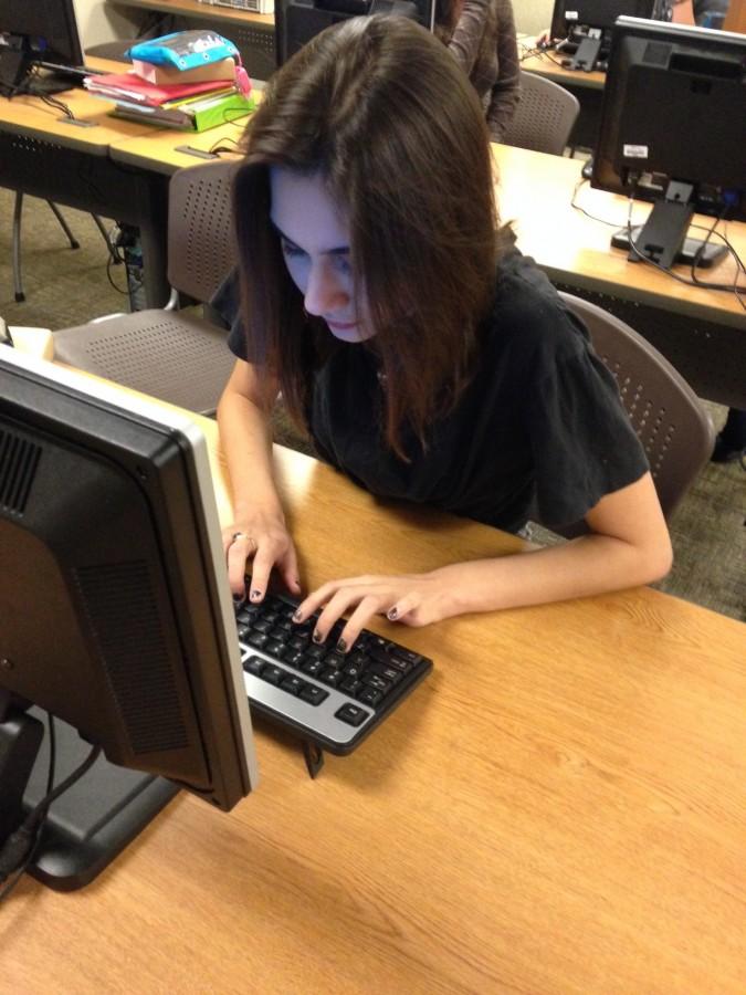 Anna Sintsirmas works on a class assignment.  Photo by Alivia Tabb