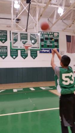 Junior guard Kunal Dixit shoots a free throw in practice.  Photo by Michael Cook.