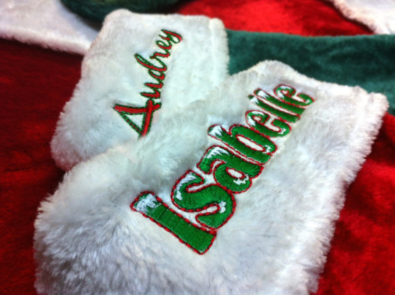 Laurie Coppersmith embroiders personalized stockings running at $25.99. Photo by Laurie Coppersmith