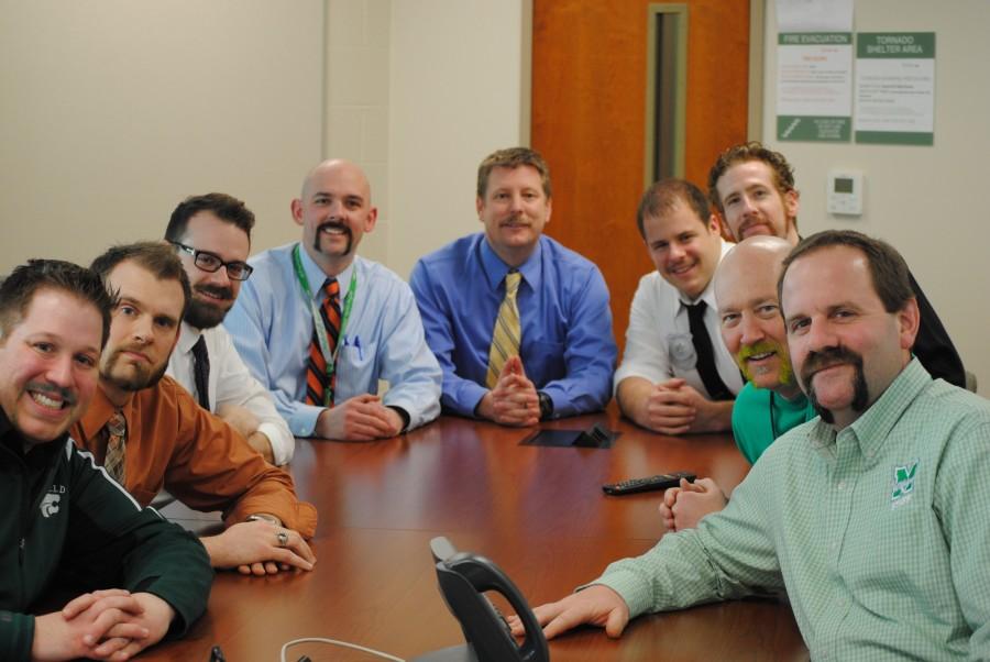 The 2015 Mustache for Cash participants. Mr. Pubentz is third from the right. 