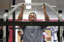 (The football team performs many different types of exercises during workouts, including pull-ups.)
Philadelphia Eagles top draft pick Danny Watkins does pull-ups as he works-out with other Eagles players at Power Train in Cherry Hill, New Jersey, on July 21, 2011. (David Maialetti/Philadelphia Daily News/MCT)