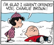 Lucy knocks Charlie Brown over with a snowball, in this comic strip originally published by Charles Schulz on Dec. 9, 1968.