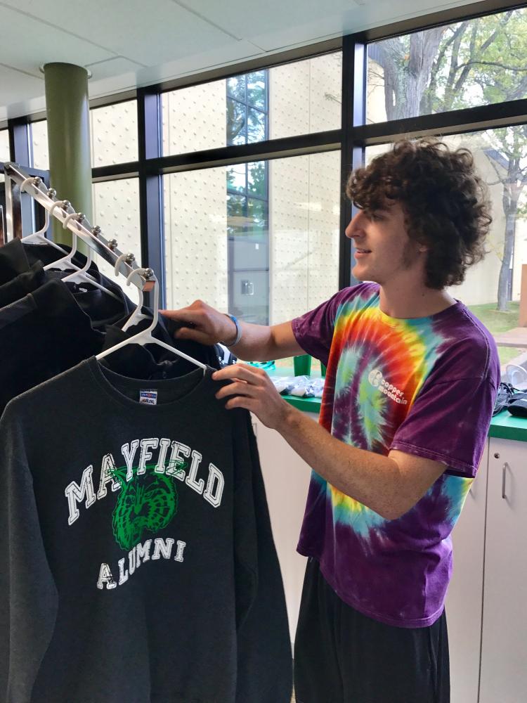 Senior Jason Gugick takes a look at the fresh merch offered in the Spirit Store.