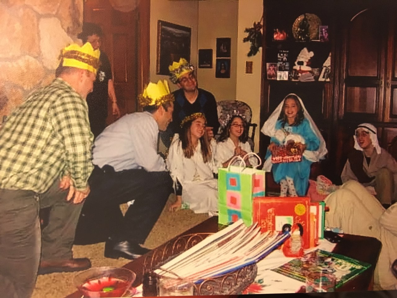 The Casey family smiling, decked out in their costumes,
as the gifts are being presented to baby Jesus at the
climax of the play.
