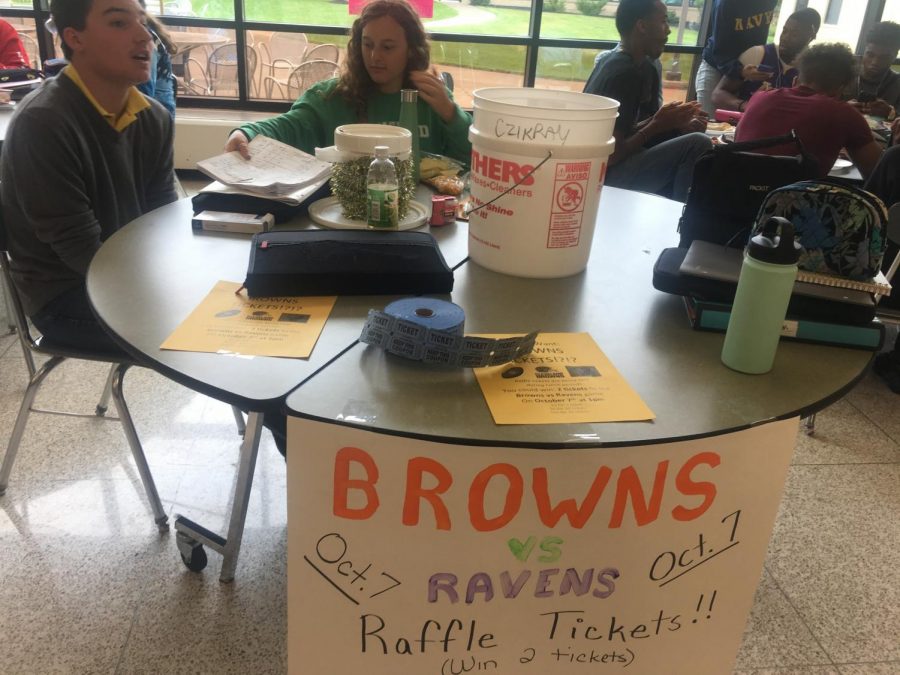 Senior and co-president of Cats Cabinet Elizabeth Reisman sells raffle tickets during her lunch period.  Reisman and many other MHS students keep busy with clubs and sports.