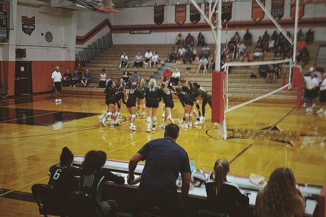 The varsity volleyball, along with the other JV and freshman teams, will participate in the Dig Pink fundraiser game this Thursday. 
 Pictured, the varsity team shakes hands with their opponents in a game against Eastlake North at North High School.