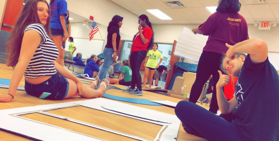 Sophomores Reagan Sovchen and Sophia Woods met with other student council members over the summer to help create decorations for the homecoming assembly and dance.  