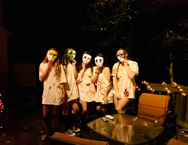 Jordan Watson and her friends celebrate Halloween in their matching Purge costumes
Left to right: Alison Laws, Allison Urban, Maggie Hall, Liv Farinacci, and Jordan Watson
