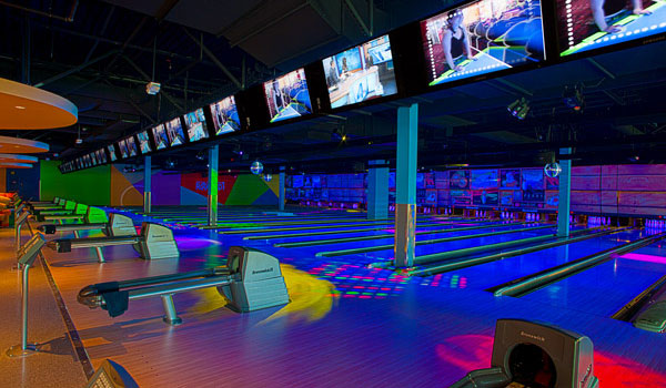 Consider cosmic bowling at Round 1 at the Great Lakes Mall.  It's offered after 8pm on weekdays and after 6pm on weekends.