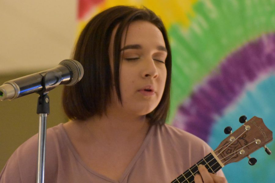 Junior Angelina Beukemann performs a song on the ukulele at Open Mic Night.  The event was a successful fundraiser for the junior class, as they have been raising funds to subsidize the cost of prom tickets. 