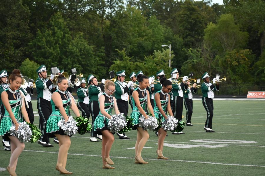 Under the leadership of Daisha Levy, the auxiliary team performs in the home opener in August.