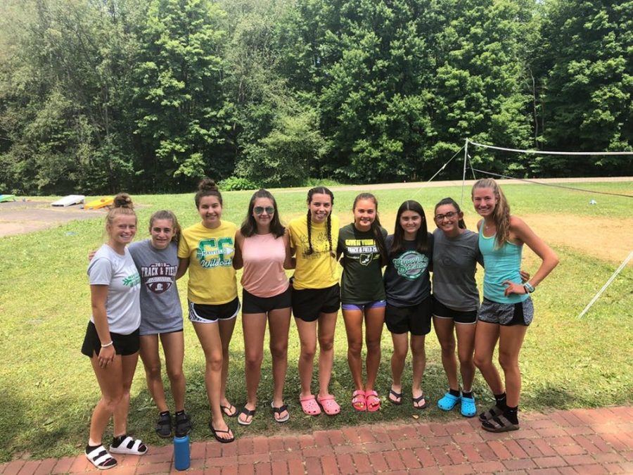 The girls were all smiles after attending a camp taught by accomplished college runners.