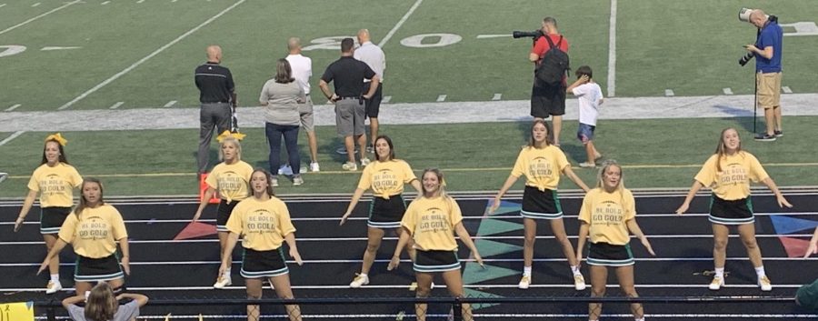 The cheerleaders wear their St. Jude shirts on the sidelines at the annual St. Jude fundraiser game.