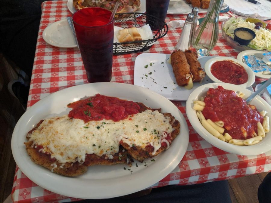 BAKED WITH LOVE: Mama’s Roberto’s “Chicken Parmigiano” is sure to turn heads with its delicious cuts of chicken, sweet sauce, and melty mozzarella cheese.