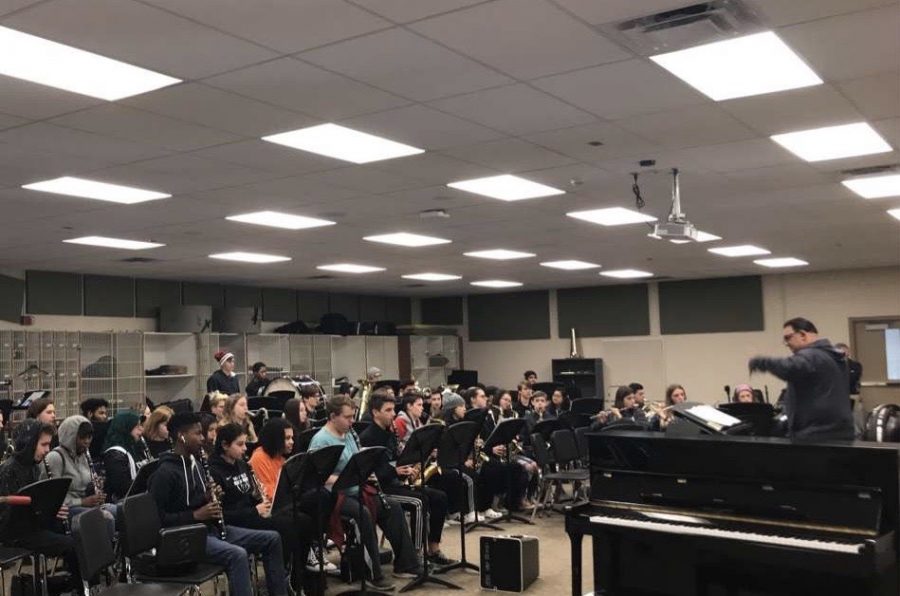 Mike Palermo instructs the band during class on Friday, Feb. 21.  Each band has spent the last two months working to prepare for the winter band concert, which takes place in early March. 