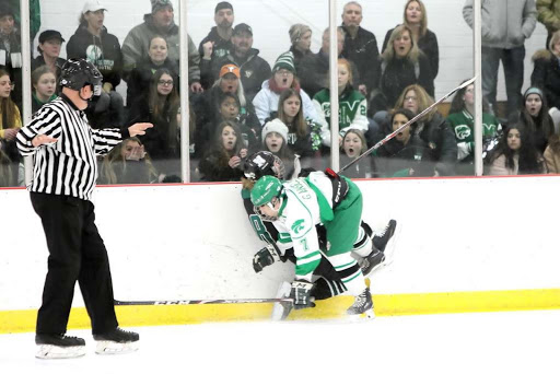 OUCH! Gavin Anselmo takes a big hit against the glass during the teams game versus Nordonia.  

