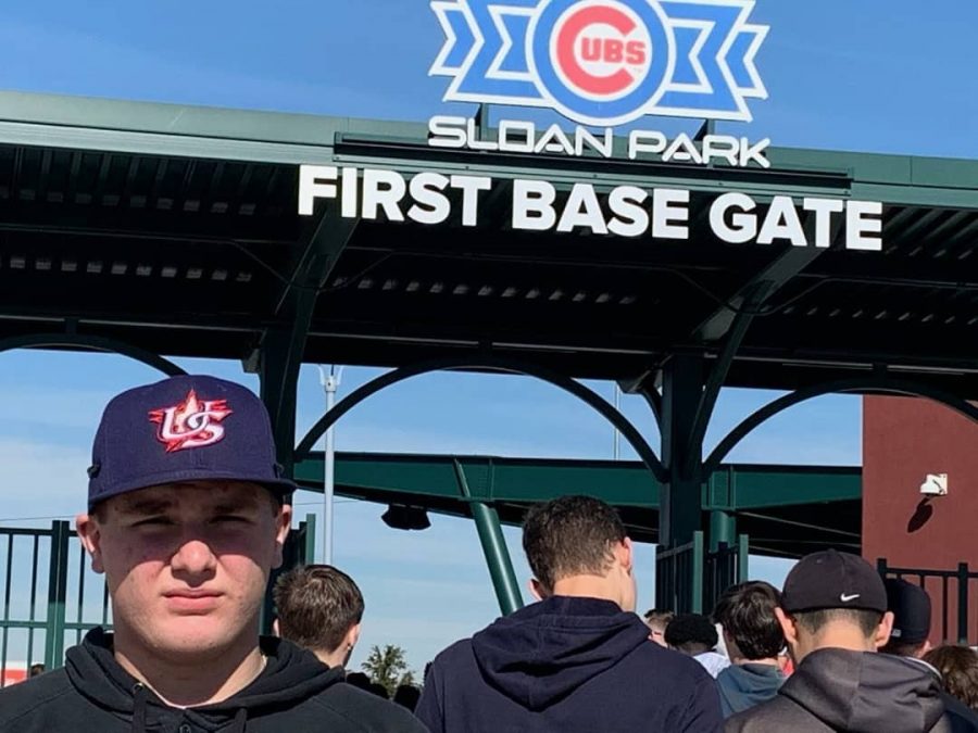 BIG MAN ON CAMPUS: Dylan Gamber stands in front of the Sloan Park First Base Gate entrance. Gamber was selected by Under Armour to compete in an event in Arizona.