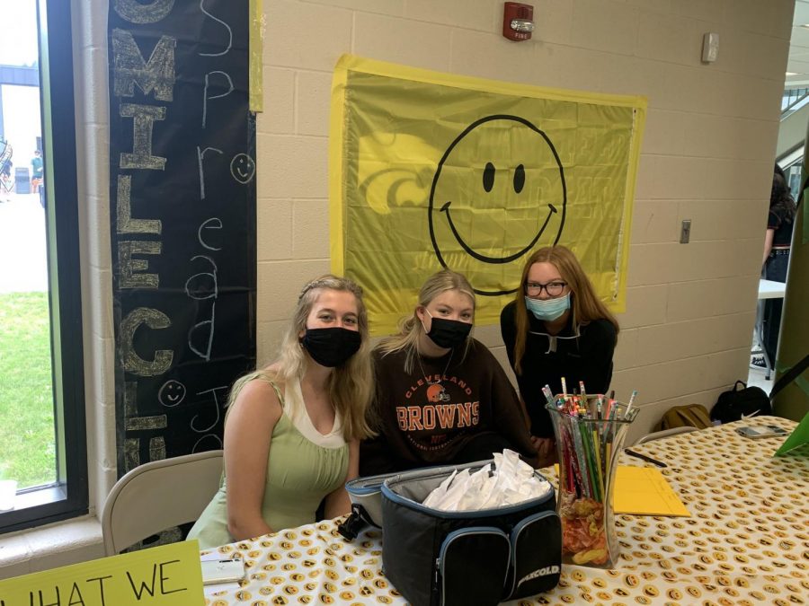 Madison Ferrell, Hannah Gross, and Natalie Purgar try to recruit students to join their club at the annual Club Fair.