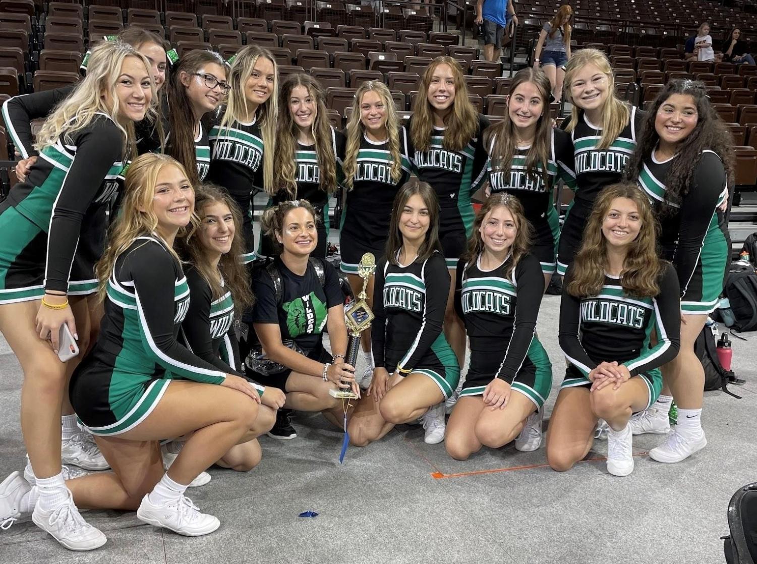 JV cheer coach takes over varsity squad – The Paw Print