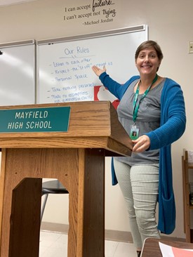 English teacher Gabrielle Ciofani shows her class rules, as she long-term subs for English teacher Paige Zenovic.