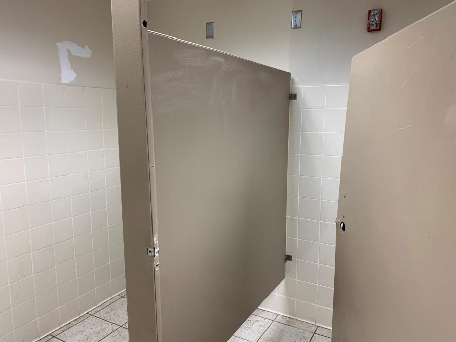 The boys bathroom by the Library Media Center reveals painted over graffiti and a missing lock on the stall door. This bathroom was closed for over a week while custodians repaired significant and costly damage. Principal Jeff Legan said, 