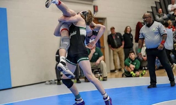 In a match last season, Braeden Beck tries a takedown move on his opponent. Beck, now a senior, is a captain on the team. 