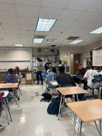 The AP Chemistry class, instructed by Mrs. Christina McClure, is working on net ionic equations. 