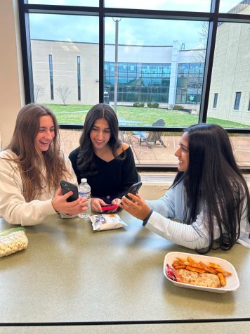 As they scroll through photos from last years Winter Break, sophomores Rachel Gifford, Francesca Diasio, and Rhea Deshpande discuss what they have planned for this years break that starts this weekend.