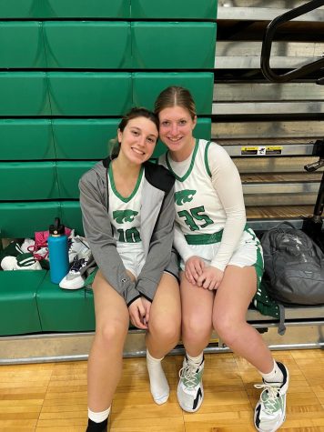 Seniors Gigi Raguz and Mia DeVito celebrate their varsity basketball win over Euclid on Monday, Jan. 9.