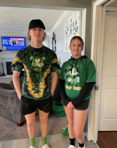 Braeden Beck and Addison Beck get ready to go to their 
cousins house for a St. Patricks Day party in 2022.