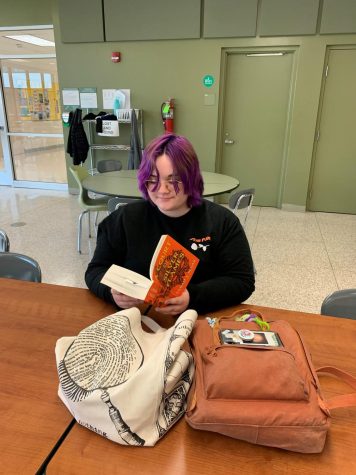 Sophomore Erin Kerr reads the ACOTAR series during her study hall.